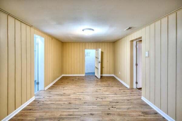3701 Monroe Street Gary, IN 46408 - Photo 17 of 22 a view of an empty room with wooden floor