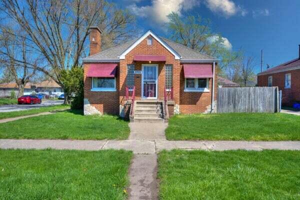 3701 Monroe Street Gary, IN 46408 - Photo 22 of 22 a front view of house with yard and green space