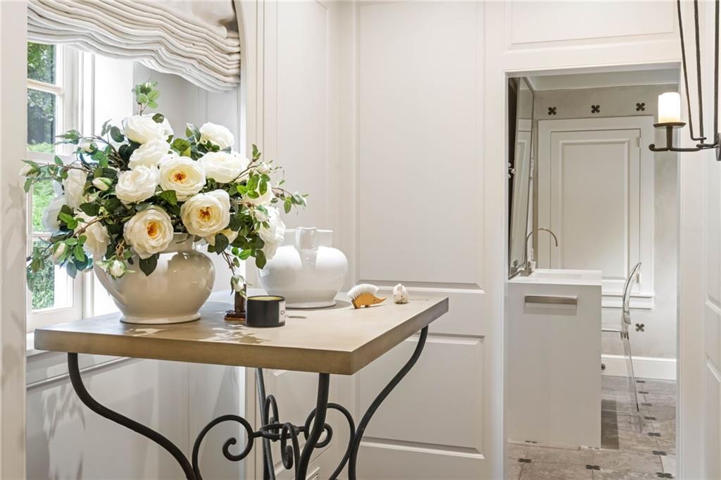 1727 West Paces Ferry Road Northwest Atlanta, GA 30327 - Photo 15 of 26 a close view of dining table with potted plant