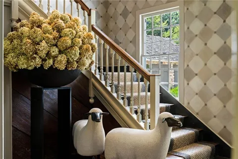 a view of entryway with wooden floor