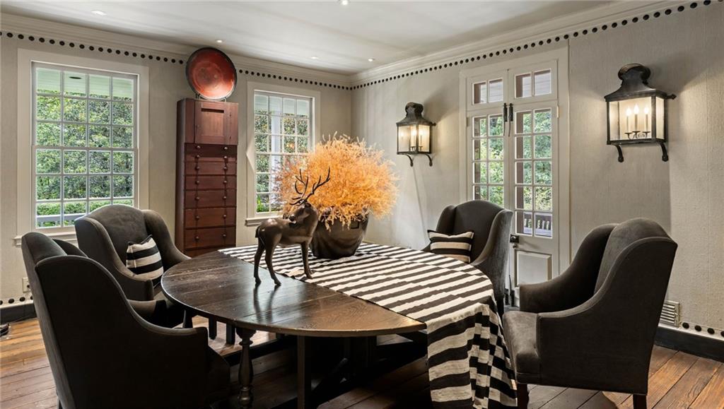 1727 West Paces Ferry Road Northwest Atlanta, GA 30327 - Photo 8 of 26 a view of a dining room with furniture window and outside view