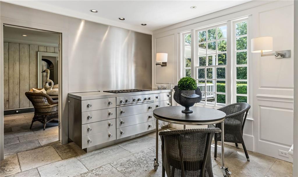 1727 West Paces Ferry Road Northwest Atlanta, GA 30327 - Photo 9 of 26 a dining room with furniture and window