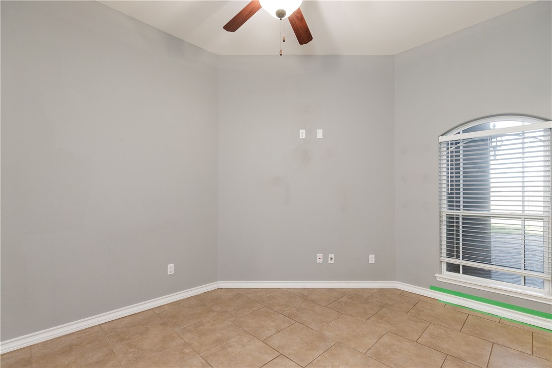 8314 Excalibur Road Corpus Christi, TX 78414 - Photo 13 of 26 an empty room with a empty space and window