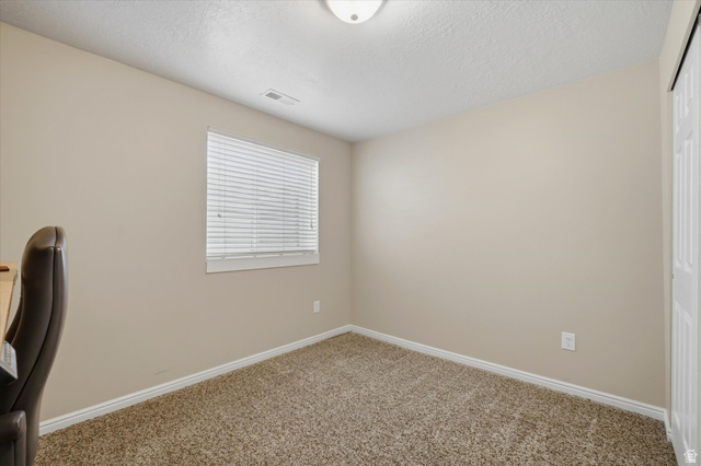 5576 South 4100th Street West Roy, UT 84067 - Photo 28 of 35 Basement bedroom