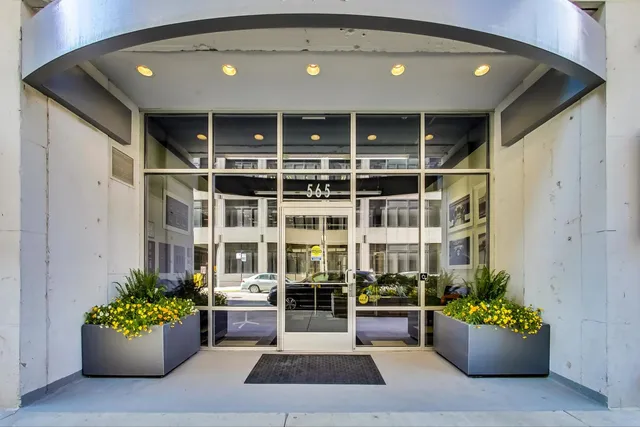 a view of a entryway of the house and living room