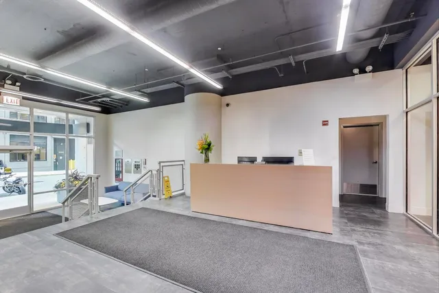 a view of a livingroom with furniture