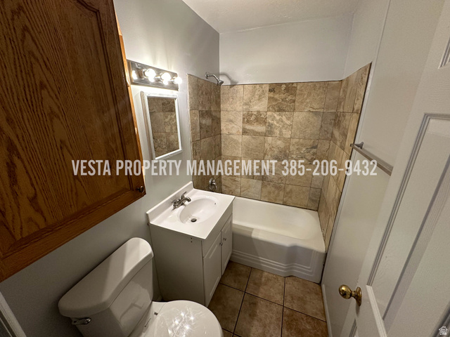 471 East 22nd Street Ogden, UT 84401 - Photo 4 of 12 Full bathroom featuring vanity, shower / bathtub combination, and light tile patterned flooring