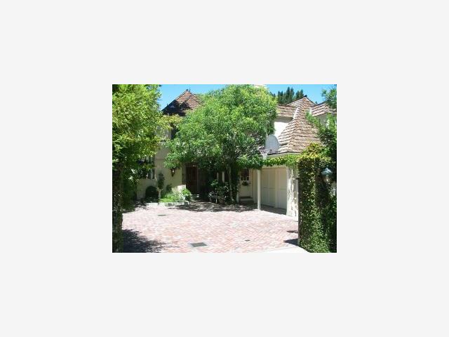 520 Roehampton Road Hillsborough, CA 94010 - Photo 1 of 1 a view of a backyard with plants