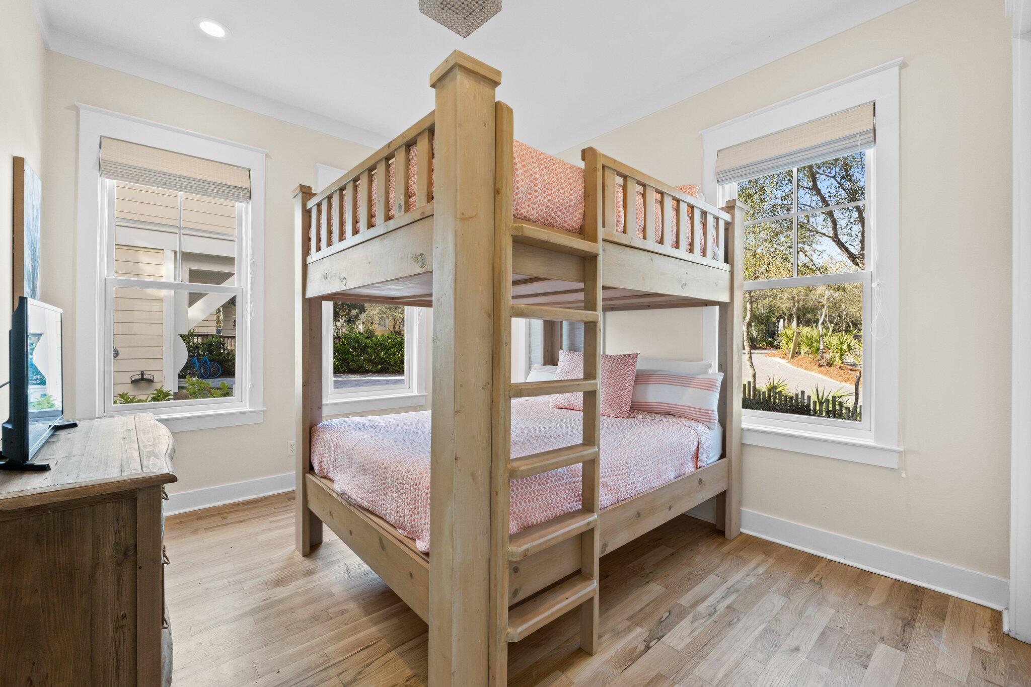 64 Chelsea Loop Road Santa Rosa Beach, FL 32459 - Photo 13 of 57 a bedroom with a bed and a large window