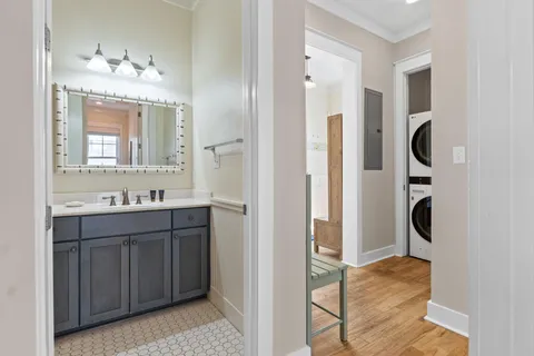 a view of a hallway with washer and dryer