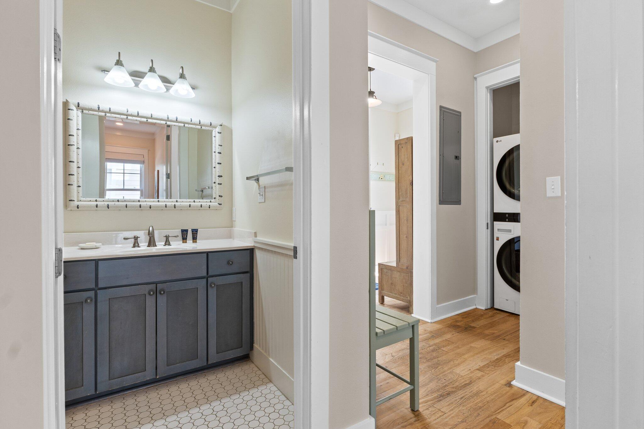 64 Chelsea Loop Road Santa Rosa Beach, FL 32459 - Photo 17 of 57 a bathroom with a sink and a mirror