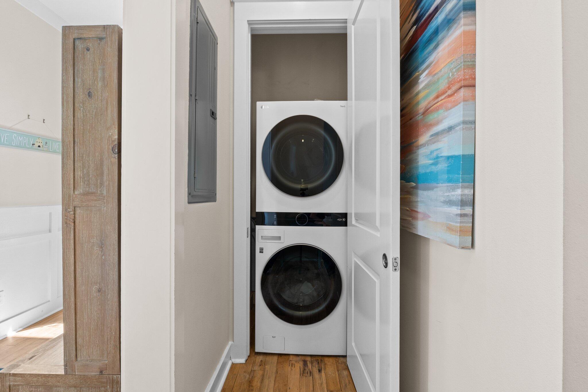 64 Chelsea Loop Road Santa Rosa Beach, FL 32459 - Photo 18 of 57 a view of a hallway with washer and dryer
