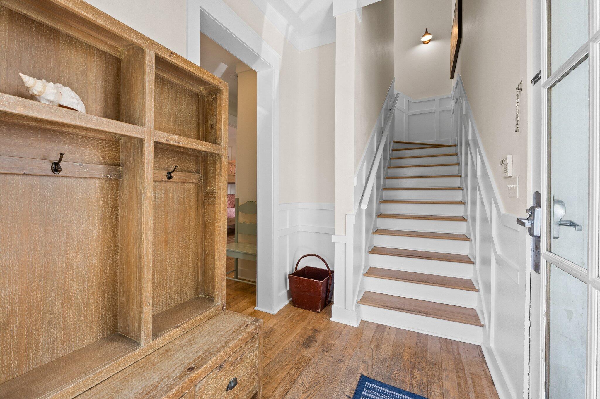 64 Chelsea Loop Road Santa Rosa Beach, FL 32459 - Photo 19 of 57 a view of a hallway with wooden floor and entryway