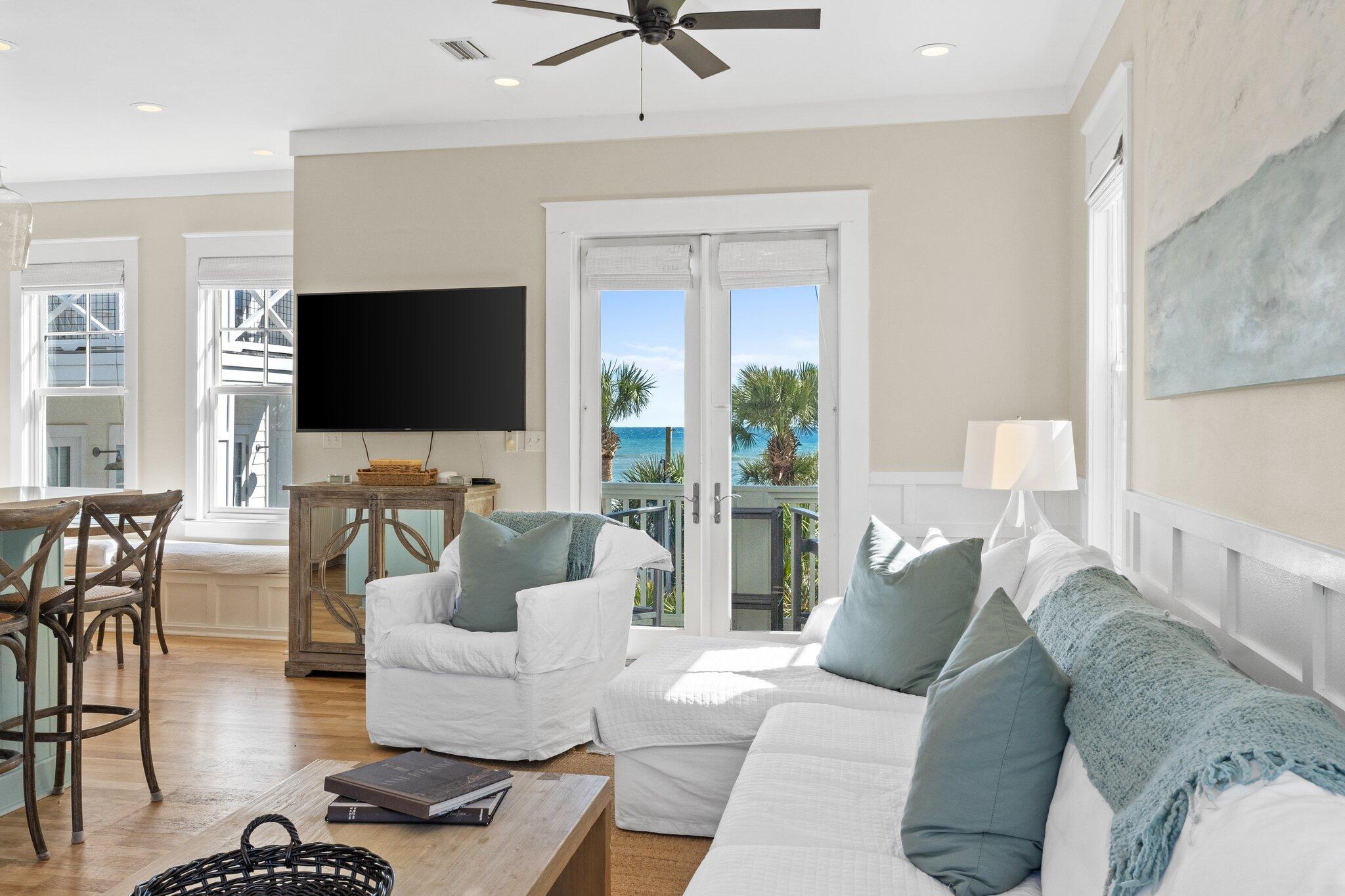 64 Chelsea Loop Road Santa Rosa Beach, FL 32459 - Photo 22 of 57 a living room with furniture and a flat screen tv
