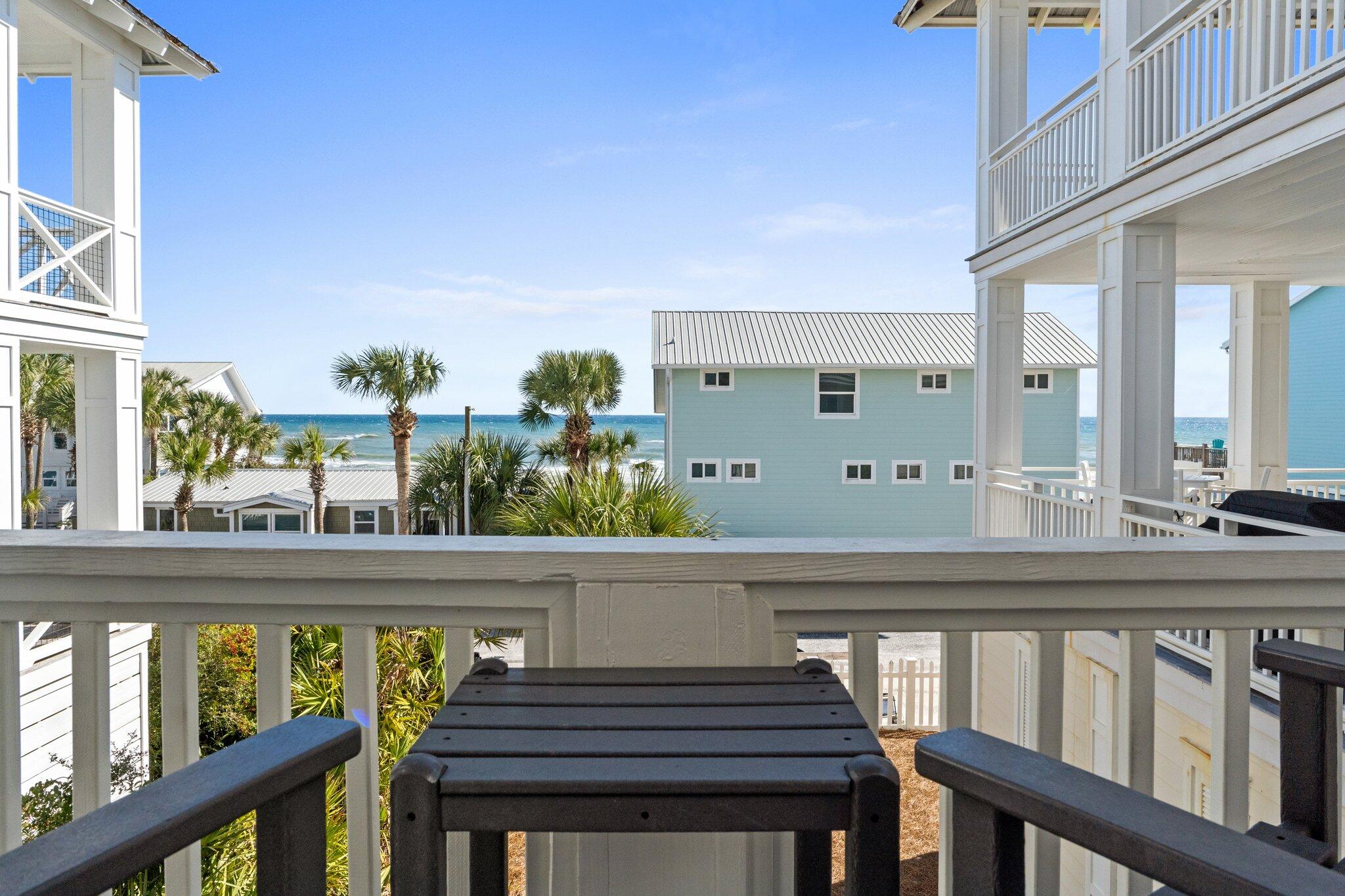 64 Chelsea Loop Road Santa Rosa Beach, FL 32459 - Photo 24 of 57 a view of a balcony with chairs