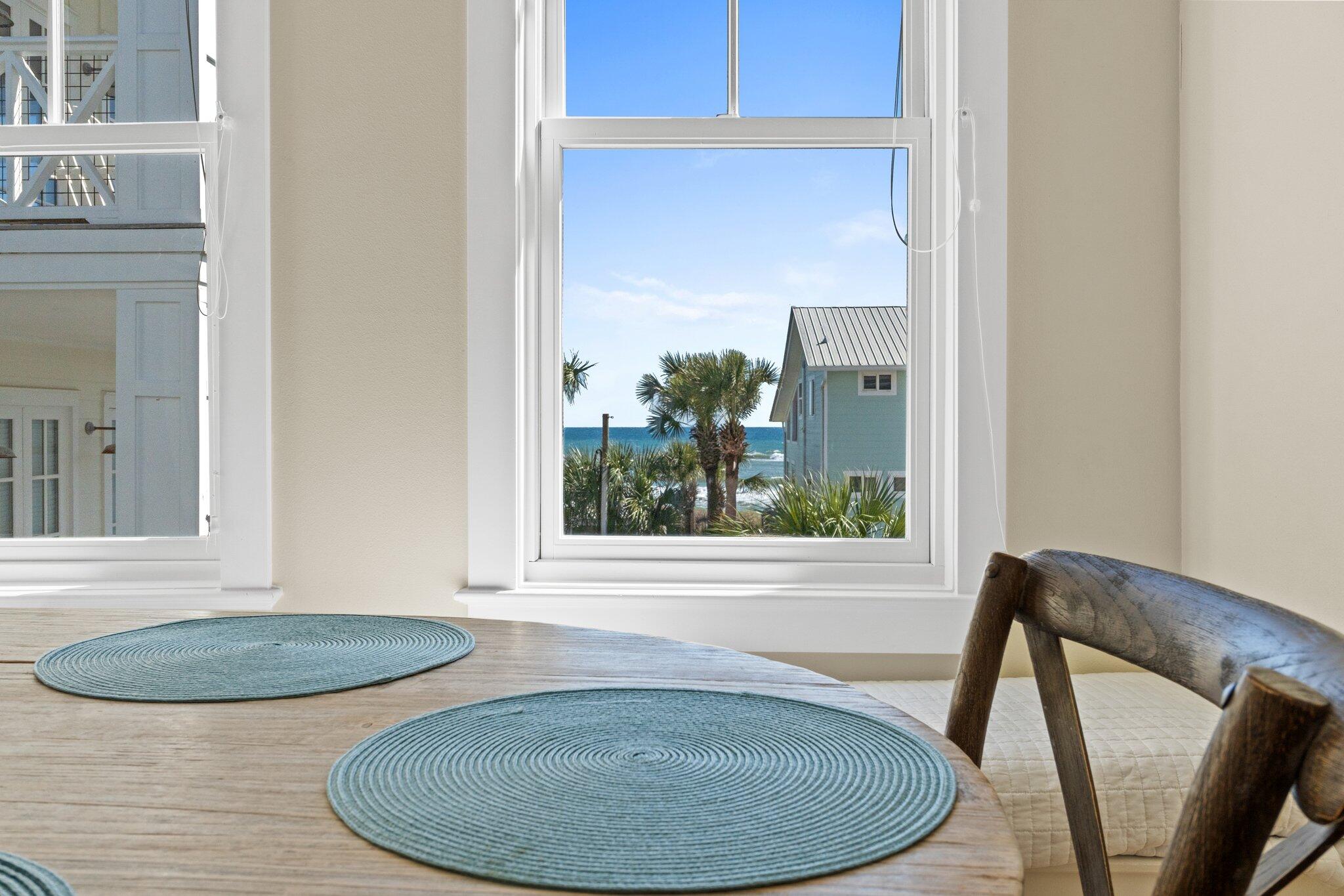 64 Chelsea Loop Road Santa Rosa Beach, FL 32459 - Photo 30 of 57 a view of a dining room with furniture window and wooden floor