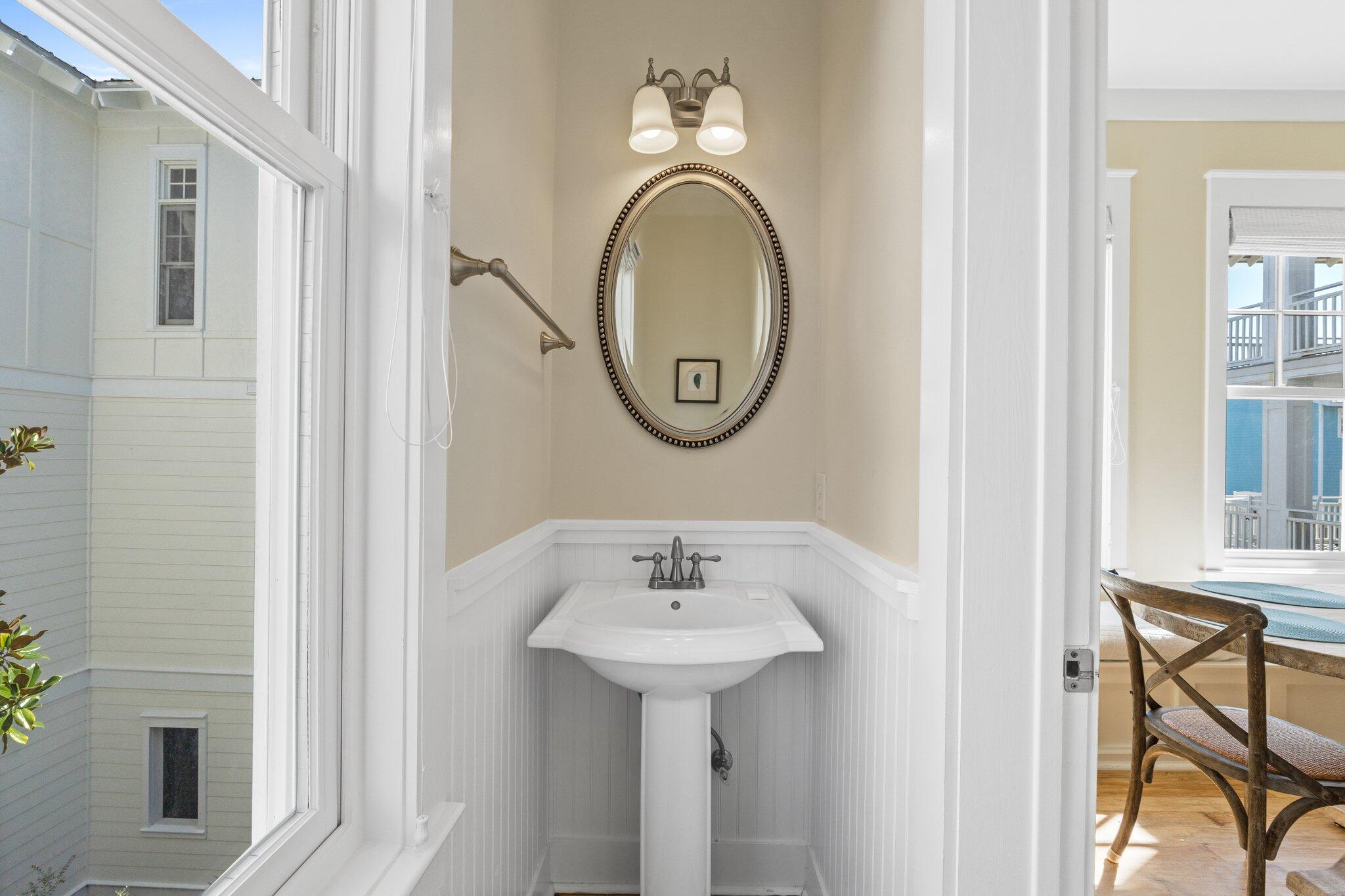 64 Chelsea Loop Road Santa Rosa Beach, FL 32459 - Photo 33 of 57 a bathroom with a sink and a mirror