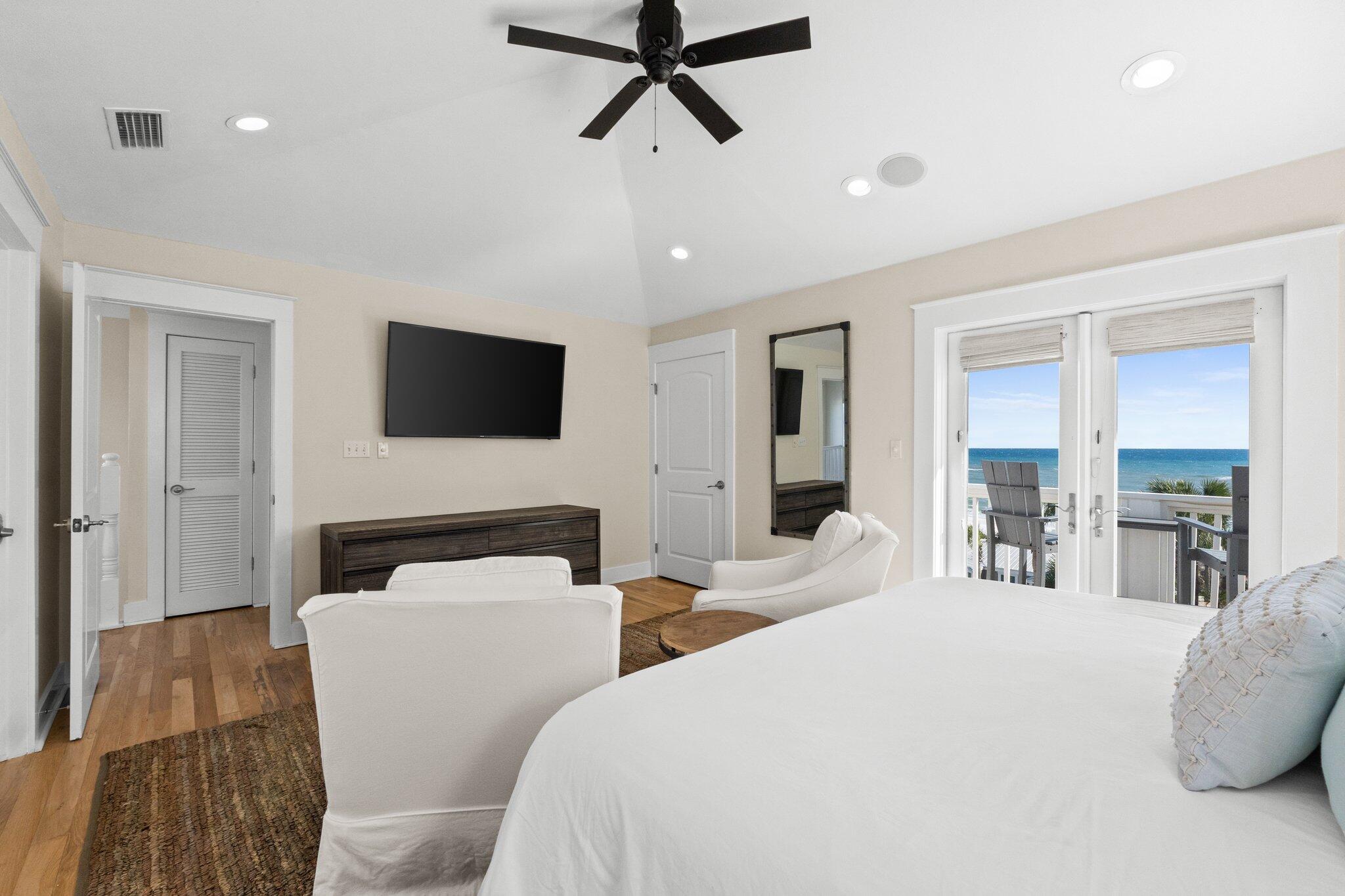 64 Chelsea Loop Road Santa Rosa Beach, FL 32459 - Photo 40 of 57 a living room with furniture a ceiling fan and a window