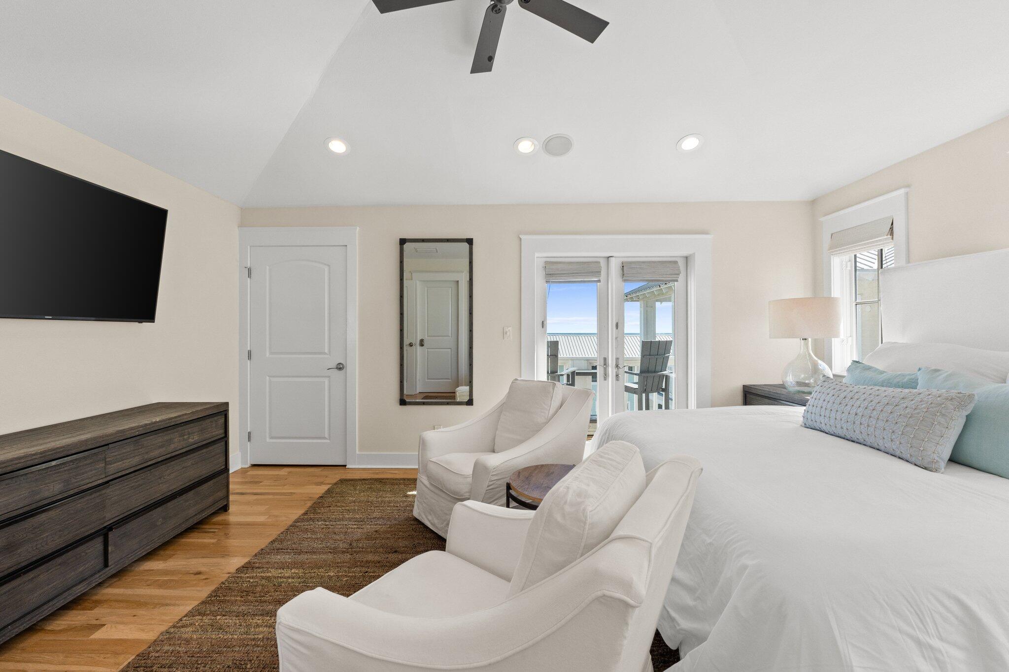 64 Chelsea Loop Road Santa Rosa Beach, FL 32459 - Photo 41 of 57 a spacious bedroom with a bed and a flat screen television