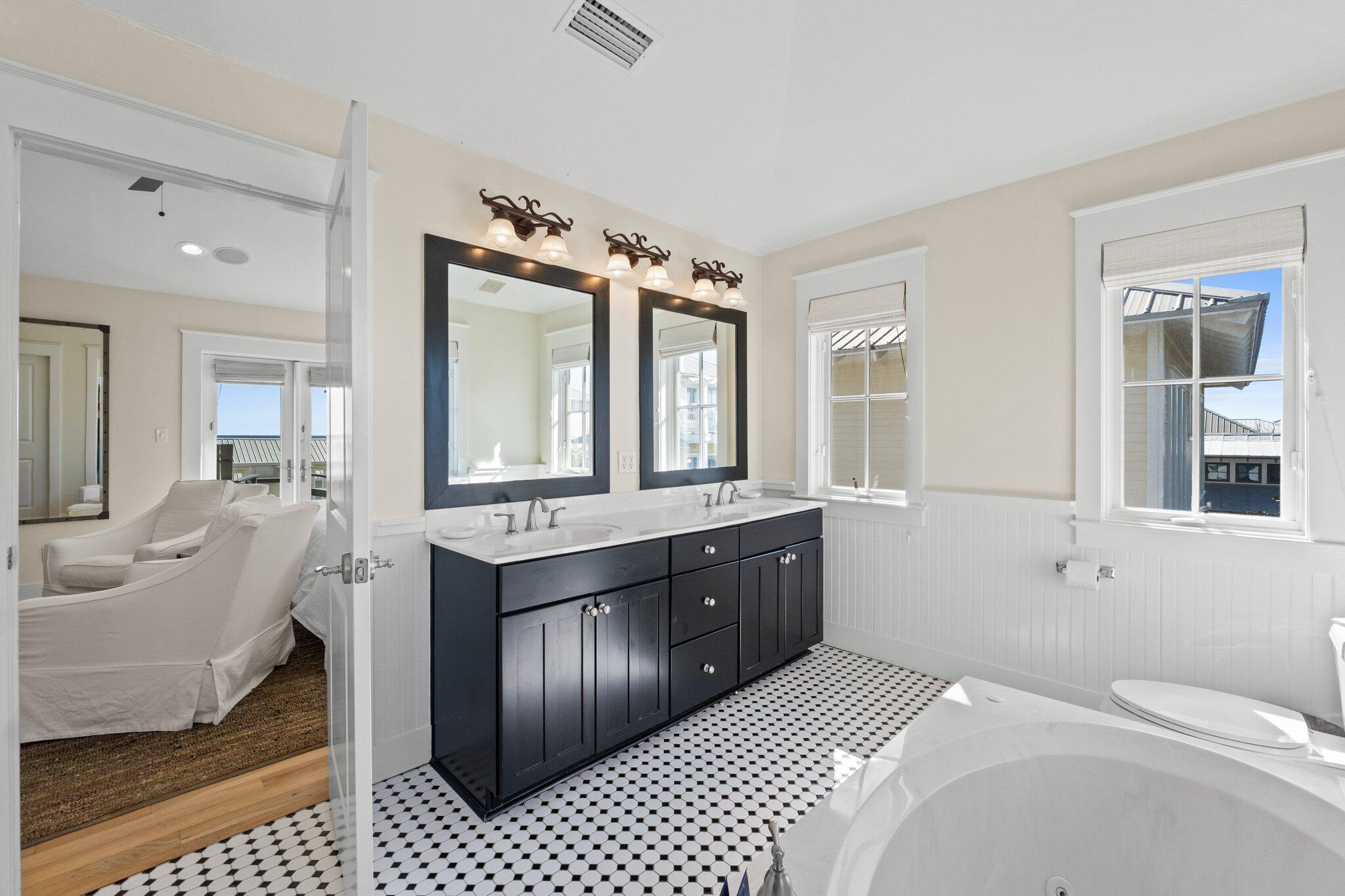 64 Chelsea Loop Road Santa Rosa Beach, FL 32459 - Photo 44 of 57 a spacious bathroom with a sink double vanity and a mirror