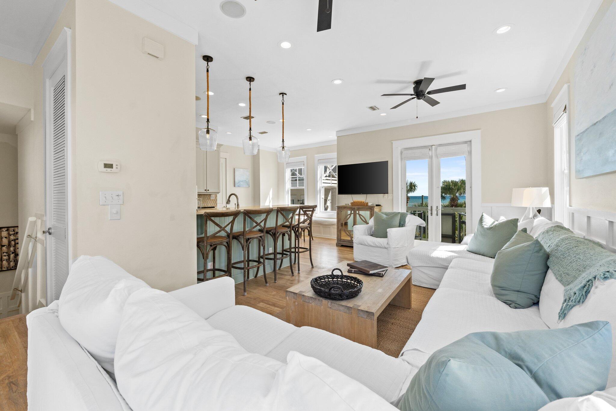 64 Chelsea Loop Road Santa Rosa Beach, FL 32459 - Photo 8 of 57 a living room with furniture and a table