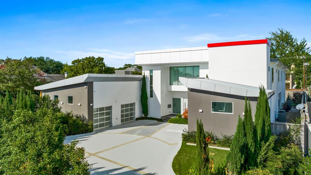 a front view of a house with a garage