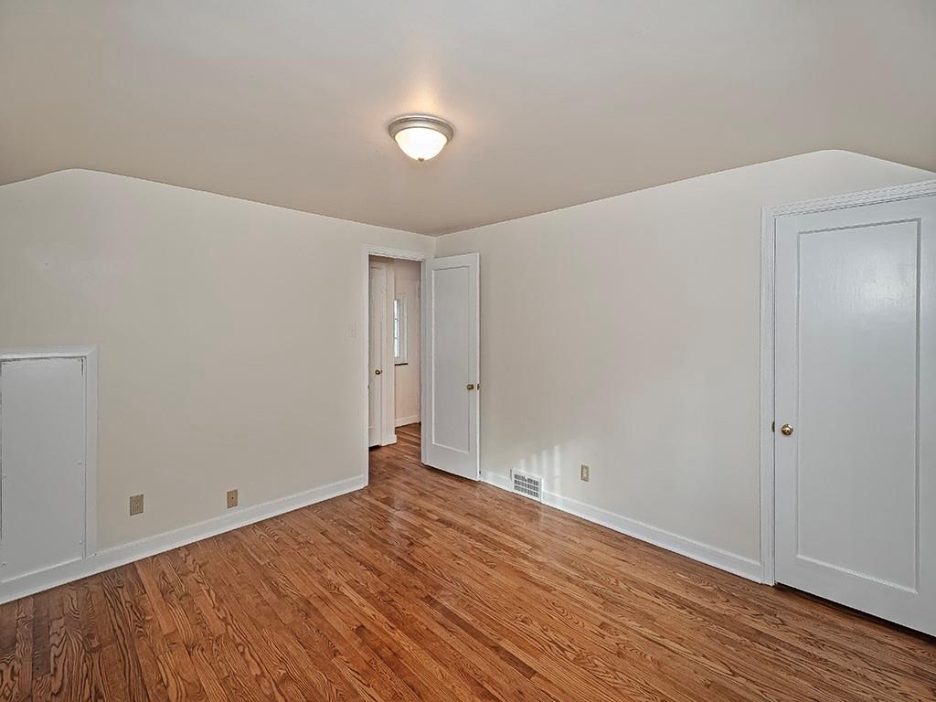 345 Rockhill Road Pittsburgh, PA 15243 - Photo 21 of 32 bedroom 2 is ideal for family or guests and has beautiful refurbished hardwood floors and a new light.