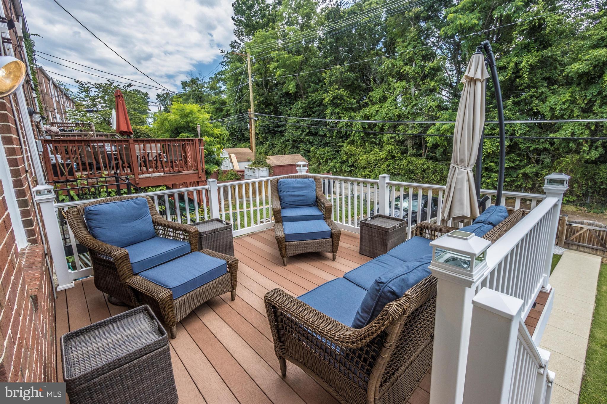 1136 Elm Road Baltimore, MD 21227 - Photo 16 of 19 Great deck backing to trees