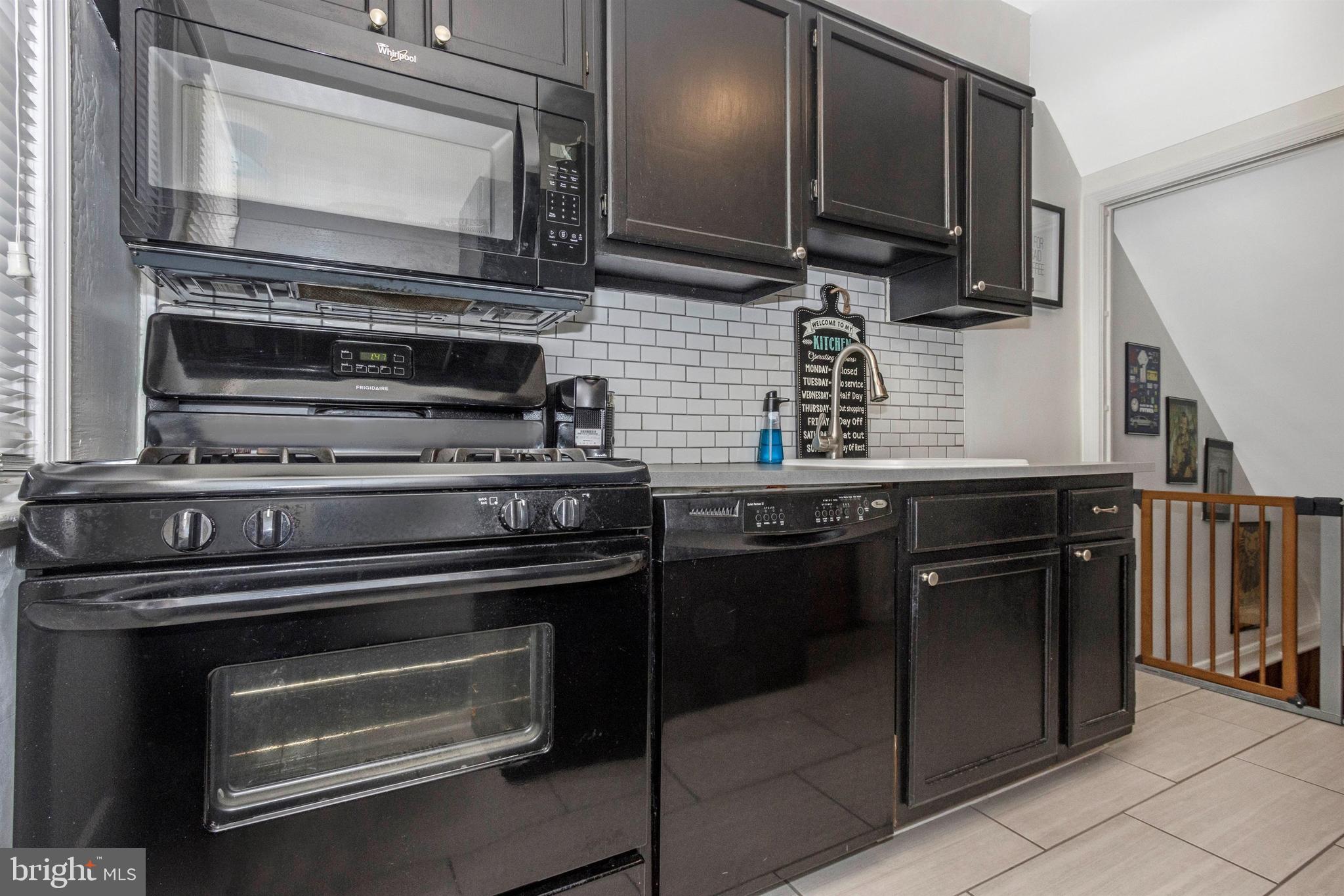 1136 Elm Road Baltimore, MD 21227 - Photo 7 of 19 Updated kitchen with new back splash