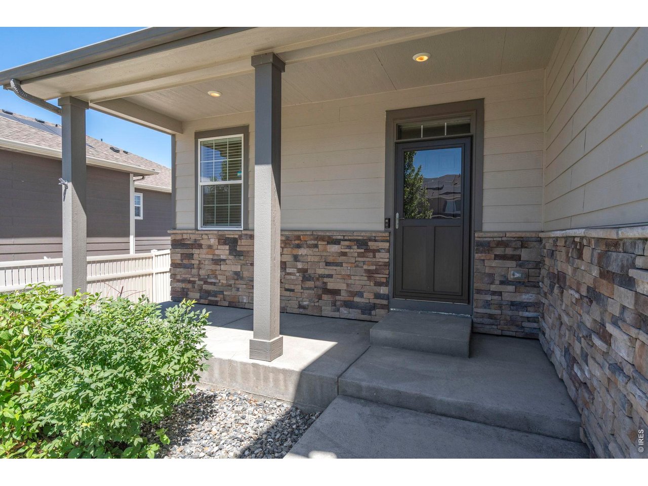 10080 Cedar Street Firestone, CO 80504 - Photo 3 of 38 Storm door added to be able to open while you are home to bring in more light