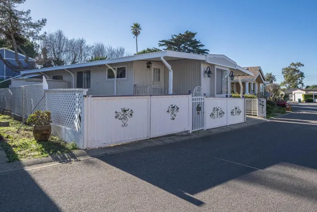 a front view of a house with a garage