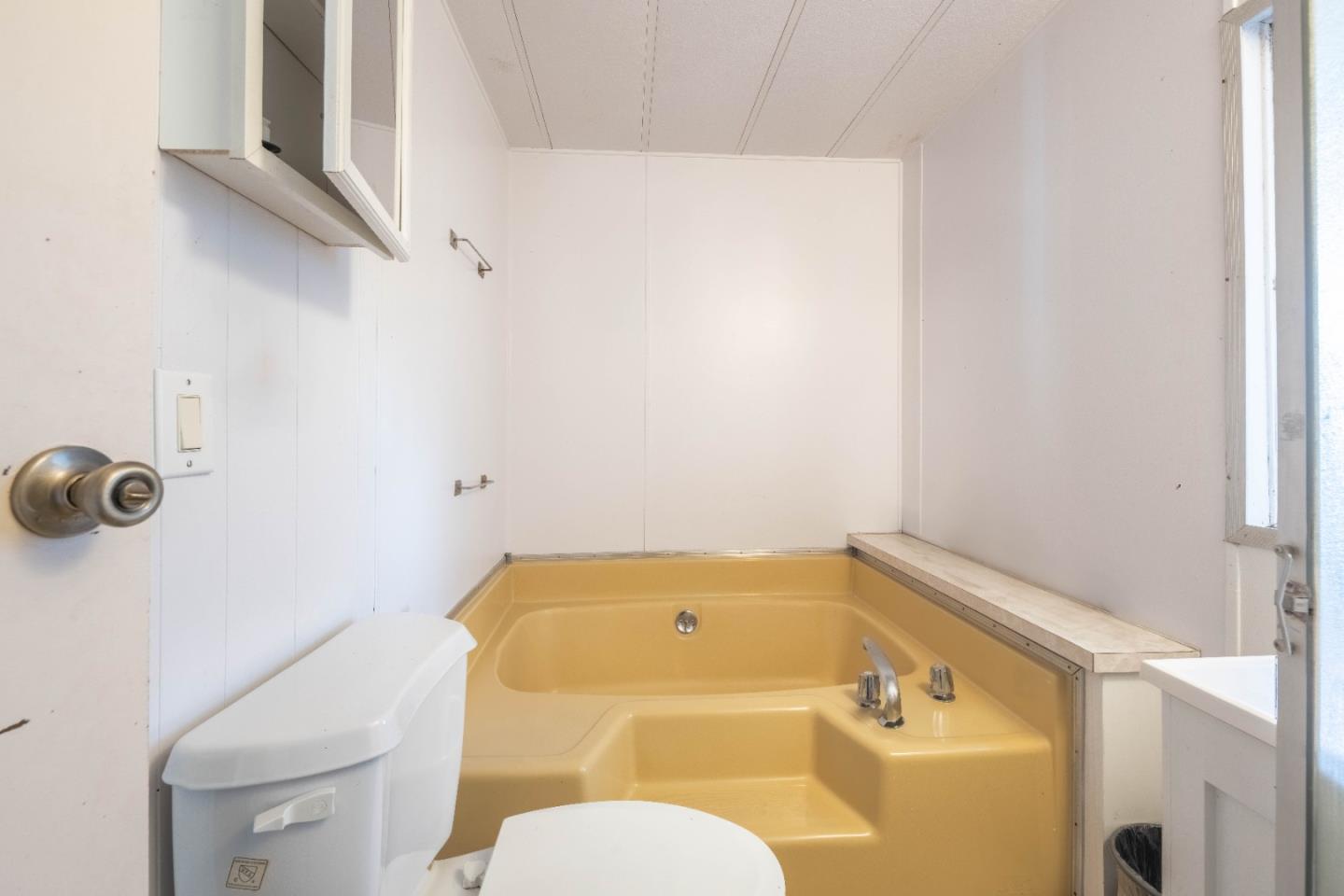 13624 Monte Del Sol, Unit 142 Castroville, CA 95012 - Photo 22 of 25 a bathroom with a sink and a toilet