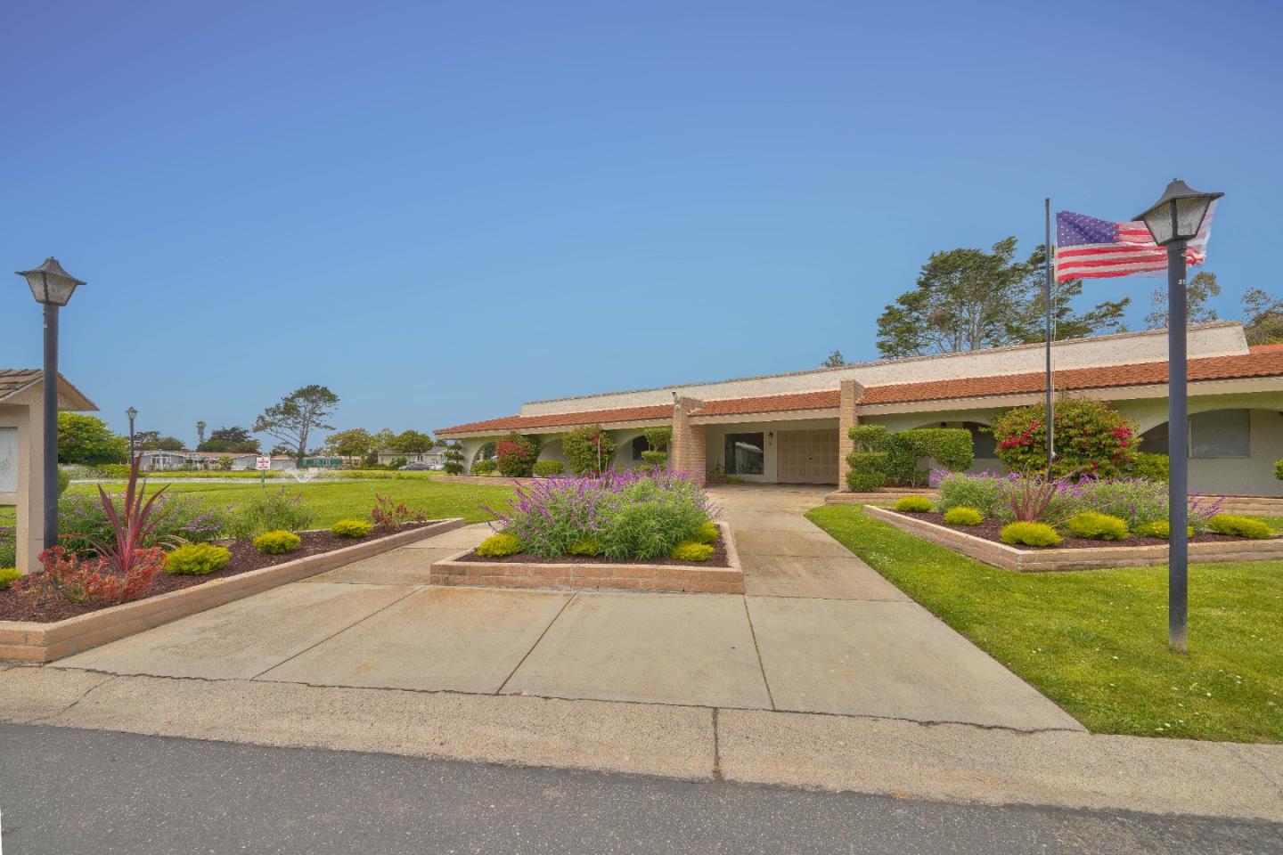 13624 Monte Del Sol, Unit 142 Castroville, CA 95012 - Photo 24 of 25 a view of house with swimming pool and yard
