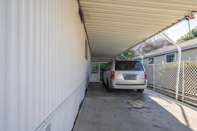 a view of a house with a back yard