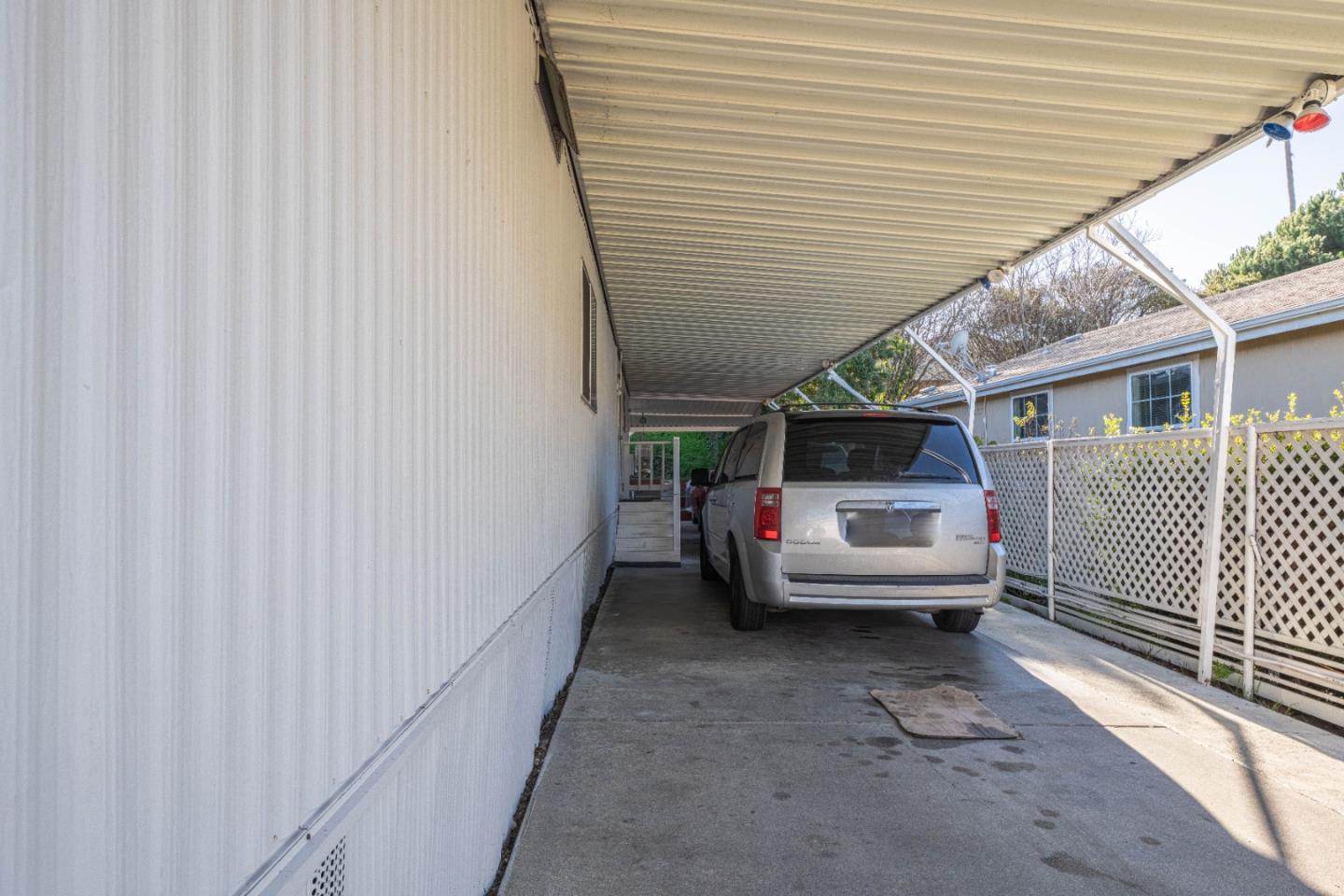 13624 Monte Del Sol, Unit 142 Castroville, CA 95012 - Photo 4 of 25 a view of a house with a back yard