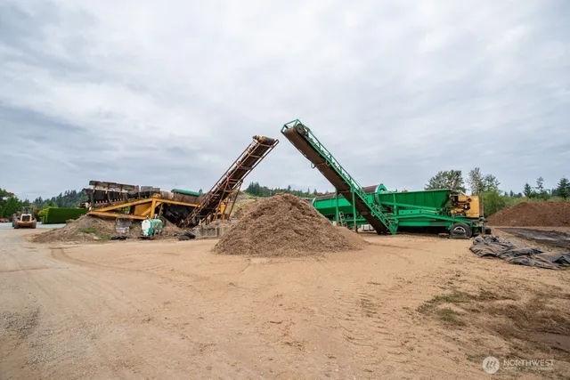 a flower vase with pink flowers