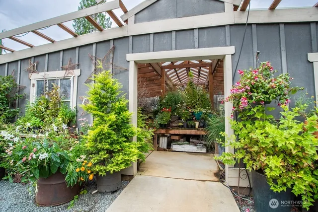 a balcony with lots of green space