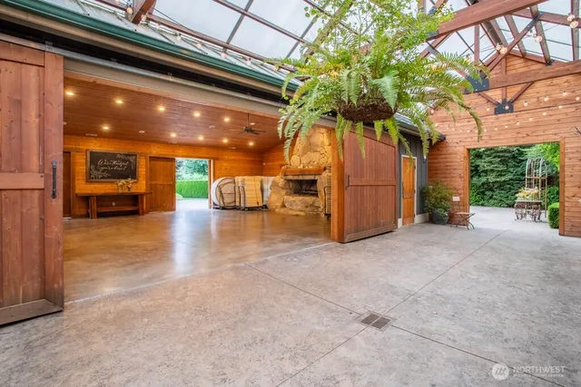 a view of a projector room with furniture and a projector