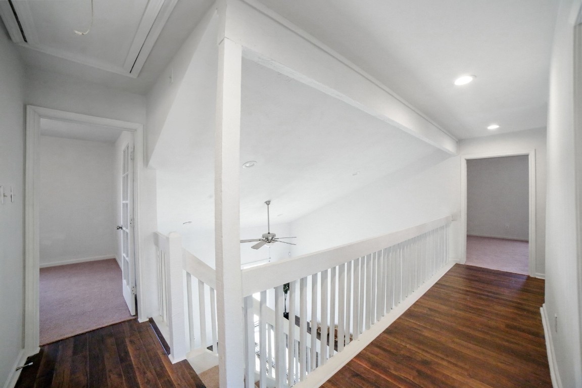 12323 Split Rail Lane Houston, TX 77071 - Photo 13 of 29 a view of a hallway with wooden floor and closet