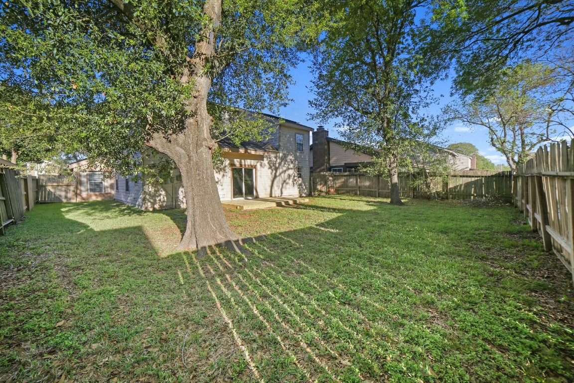 12323 Split Rail Lane Houston, TX 77071 - Photo 27 of 29 a view of yard with tree