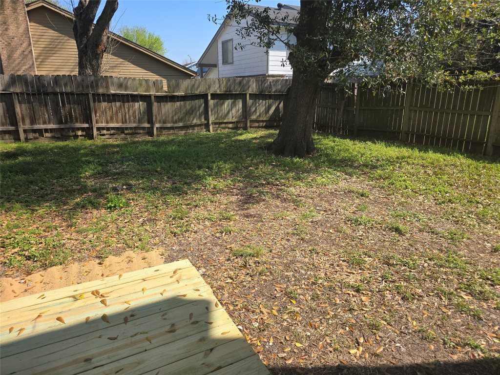 12323 Split Rail Lane Houston, TX 77071 - Photo 29 of 29 a backyard of a house with lots of green space
