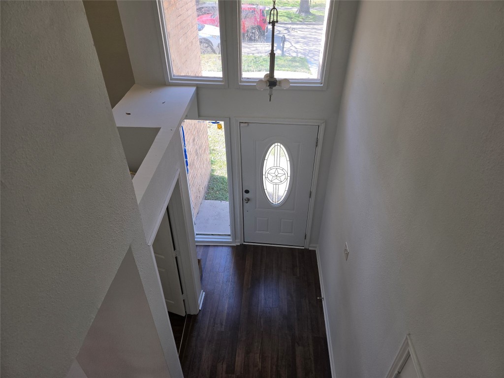 12323 Split Rail Lane Houston, TX 77071 - Photo 3 of 29 a view of a livingroom with wooden floor and a large window