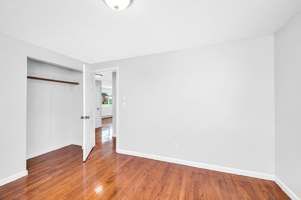 381 North Brook Road Springfield, MA 01119 - Photo 19 of 35 a view of empty room with wooden floor