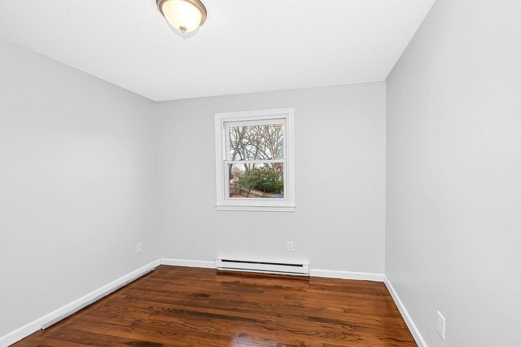 381 North Brook Road Springfield, MA 01119 - Photo 22 of 35 a view of a room with wooden floor and window