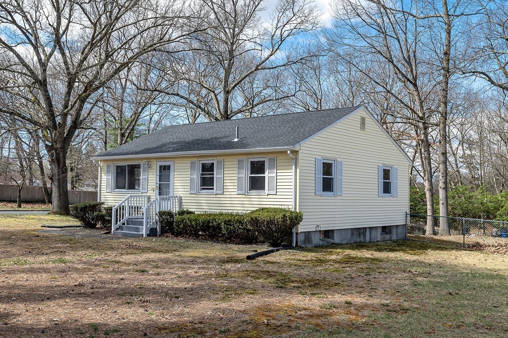 381 North Brook Road Springfield, MA 01119 - Photo 29 of 35 a front view of a house with a yard