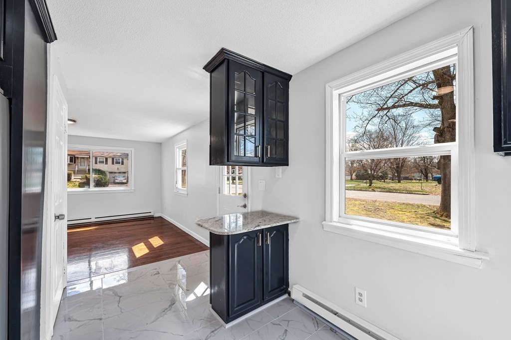 381 North Brook Road Springfield, MA 01119 - Photo 5 of 35 a view of an empty room with window and bathroom