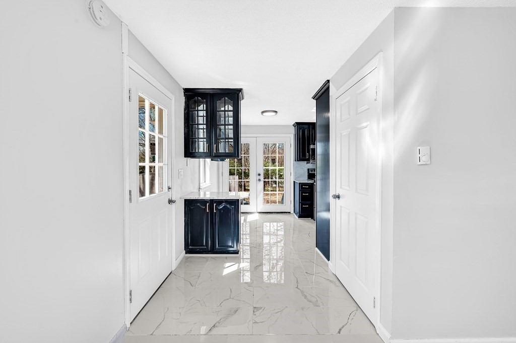 381 North Brook Road Springfield, MA 01119 - Photo 8 of 35 a view of hallway with living room and a window