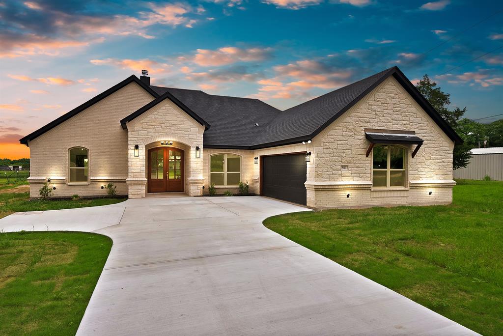 501 Harris Road Azle, TX 76020 - Photo 28 of 29 a view of a house with a yard