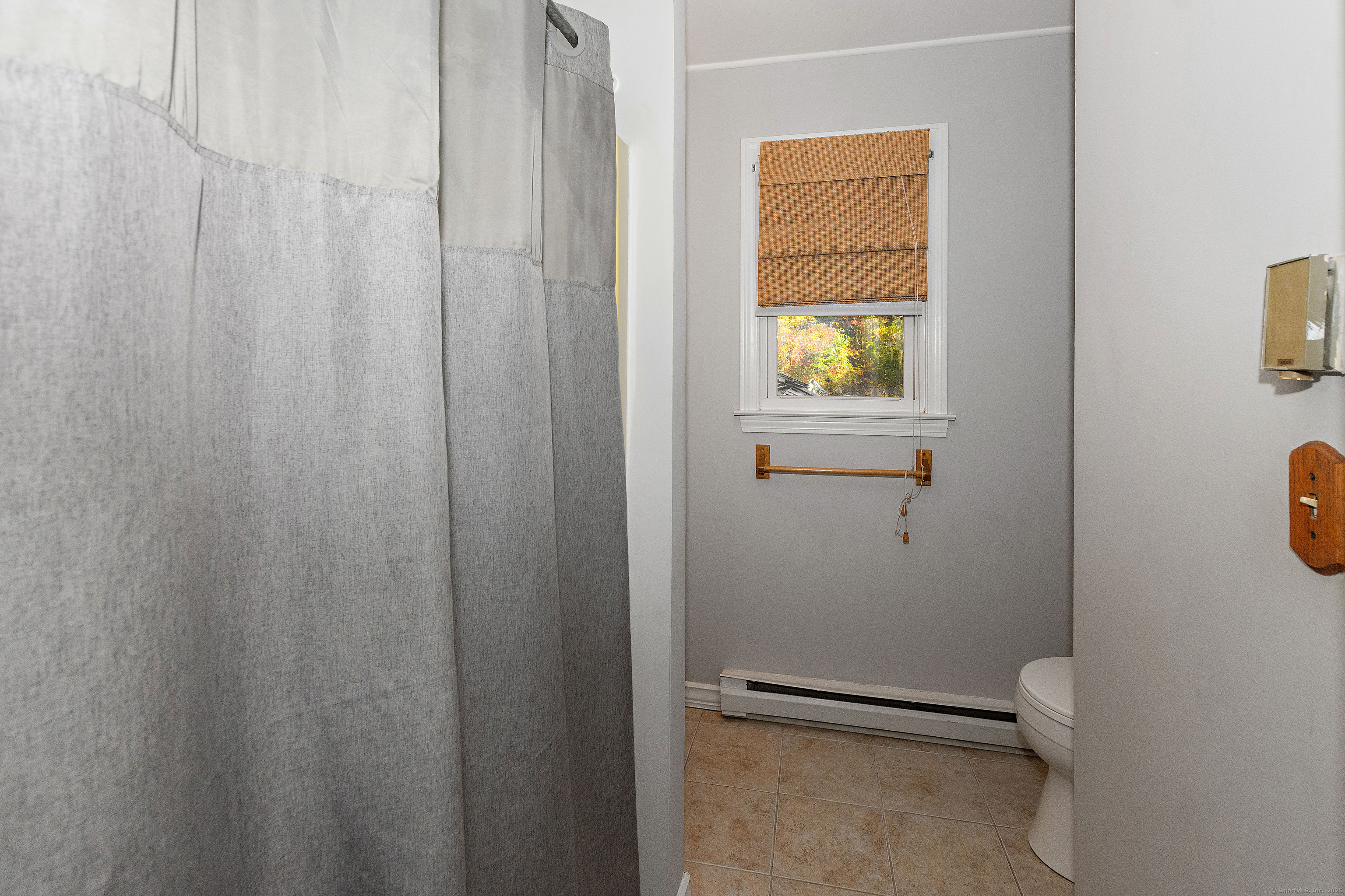 28 Juniper Lane Griswold, CT 06351 - Photo 11 of 15 a bathroom with a granite countertop toilet and a sink