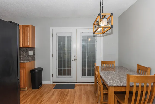 a view of a livingroom with furniture and wooden floor